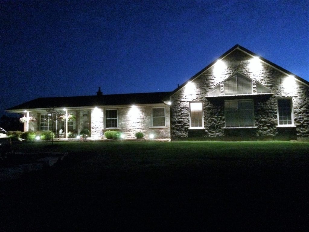 Outside lighting of house Outside lighting of a house in the night.